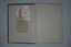 Inside front cover showing plastic coin bags attached.