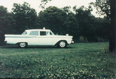 Photograph (police car)