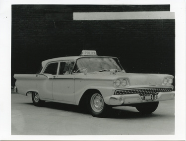 Photograph (police car)