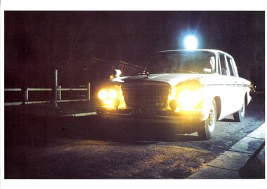 Photograph (police car)