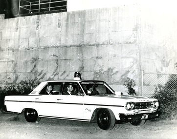 Photograph (police car)