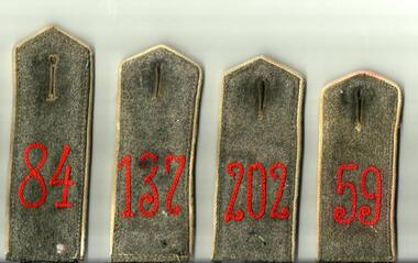 SOUVENIRED GERMAN EPAULETTES with the regiment numbers 59, 84, 137 and 202 in red