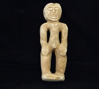 Iniet Sculpture: Male, hands on hips, Mid 20th Century