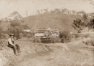 Photograph, Mr Belot smokes his pipe whilst resting at Cottle's Bridge, c.1890