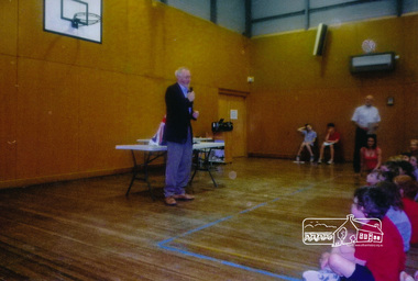 Photograph, Jim Connor giving a presentation at Research Primary School, Dec 2014, 2014