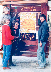 Photograph, Ron Grant, The Eltham Peace Group hanging the Hiroshima Day Banner on the Community Notice Board, Arthur Street, Eltham; Community Arts 1986 'As We Are' Banner Project Group, Hiroshima Day, 6 August 1986