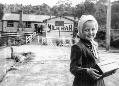 Photograph, Constance Dandy standing in Were Street, Montmorency, 8 Oct. 1950