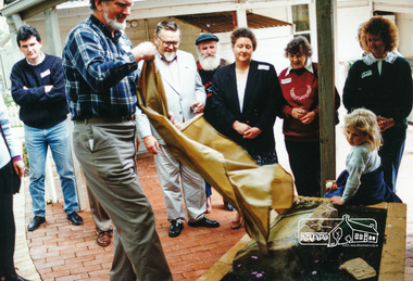 Photograph, Councillor John Graves, President, Shire of Eltham, Jock Kyme (centre) and Leslie Shuttleworth at the unveiling of the centre made plaque in the forecourt, Eltham Living and Learning Centre, 10 October 1994, 10/10/1994
