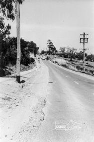 Photograph, Looking south along Main Road towards Bridge Street from the intersection with Henry Street, Eltham, February 1968, Feb 1968