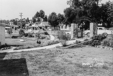 Photograph, Inside the garden of the War memorial with paths and entrance gates along Main Road, Eltham, February 1968, Feb 1968
