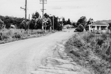 Photograph, Looking east along Diamond Street to the railway crossing near intersection with Main Road, Eltham, February 1968, Feb 1968