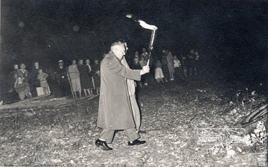 Photograph, Federal member, Frank Davis carries the torch to light the combined Briar Hill and Diamond Valley Hospital bonfire