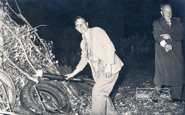Photograph, Federal member, Frank Davis carries the torch to light the combined Briar Hill and Diamond Valley Hospital bonfire