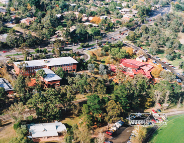 Photo album, Aerial view showing the Shire of Eltham office, new Eltham Library and relocated Shillinglaw Cottage, 1994
