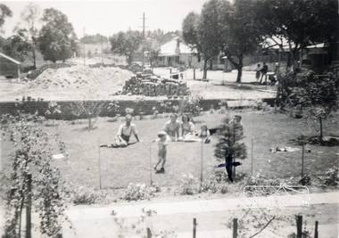 Photograph, Looking north from Staff's Railway Store overlooking garden and foundations of Lyon's Garage