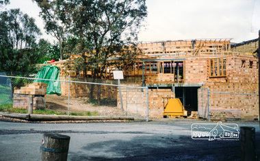 Photograph, Cr. Peter Graham, Library office and the loading bay entry, Eltham Library construction, Oct 1993, 1993