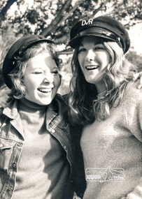 Photograph, Rutledge Films, Edith Rowe ("DVR" on cap) and Jenni Mitchell (wearing jacket) at Diamond Valley Railway, Eltham Lower Park, c.1970, 1970c