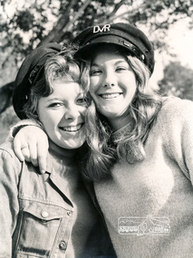 Photograph, Rutledge Films, Edith Rowe ("DVR" on cap) and Jenni Mitchell (wearing jacket) at Diamond Valley Railway, Eltham Lower Park, c.1970, 1970c