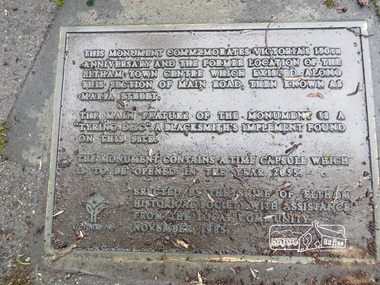 Photograph, Liz Pidgeon, Monument containing a time capsule in celebration of Victoria's 150th Anniversary and marking the location of the original centre of Eltham township, 21 June 2017, 21 June 2017