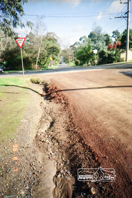Photograph, Road surface conditions around Eltham: Looking west along Franklin Street at intersection with Bible Street, 7 Aug 1996, 1996