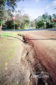 Photograph, Road surface conditions around Eltham: Looking west along Franklin Street at intersection with Bible Street, 7 Aug 1996, 1996