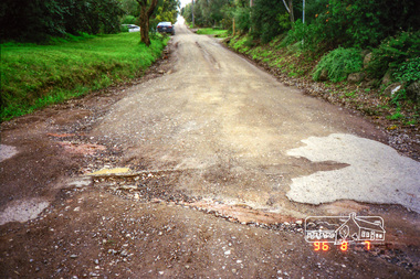Photograph, Road surface conditions around Eltham: Napoleon Street looking east from intersection with Bible Street, 7 Aug 1996, 1996