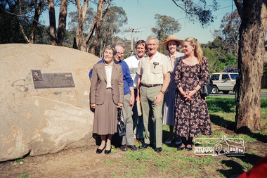 Photograph, From left, Mary Owen and John Withers, grandchildren of Walter Withers and other family members at the unveiling of the commemorative plaque on Walter Withers Rock at the corner of Bible and Arthur Streets, Eltham, 13 Oct 1990, 13/10/1990