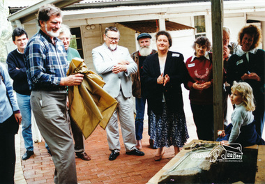 Photograph, Councillor John Graves, President, Shire of Eltham, Jock Kyme (centre) and Leslie Shuttleworth at the unveiling of the centre made plaque in the forecourt, Eltham Living and Learning Centre, 10 October 1994, 10/10/1994