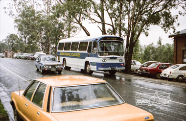 Photograph, Hurstbridge Coaches depot and Hurstbridge rail station, Heidelberg-Kinglake Road, Hurstbridge, c.1980