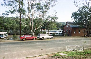 Photograph, Hurstbridge Coaches depot and Hurstbridge rail station, Heidelberg-Kinglake Road, Hurstbridge, c.1980