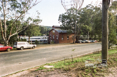 Photograph, Hurstbridge Coaches depot and Hurstbridge rail station, Heidelberg-Kinglake Road, Hurstbridge, c.1980