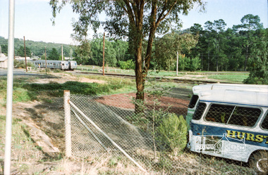 Photograph, Hurstbridge Coaches depot and Hurstbridge rail station, Heidelberg-Kinglake Road, Hurstbridge, c.1980