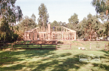 Photograph, House under construction probably viewed from Aqueduct Trail, c. Jan 1986, January 1986