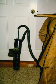 Photograph, Blacksmith's Bellows, Handwater Pump and Steam Time Whistle used at Briar Hill Timber Mill, Heritage Week, 1990