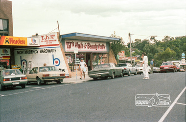 Photograph, Marjorie North, Montmorency Village Shopping Centre, looking north along Were Street towards the Railway Station, 8 Feb 1986, 1986