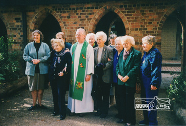 Photograph, Val Rogers, Vicar, (1989-1996), St Margaret's, Eltham wearing a butterfly stole made by the Tapestry Group, and parishoners 3 July 1996