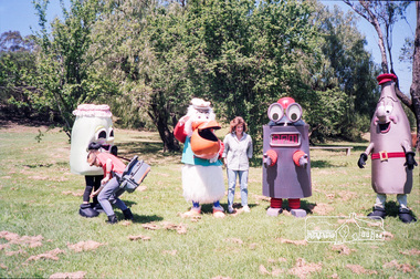 Photograph, Cr Mary Grant with Recycling mascots, c.1990