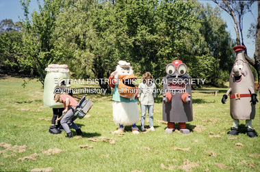 Photograph, Cr Mary Grant with Recycling mascots, c.1990