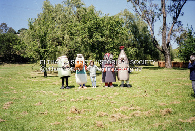Photograph, Cr Mary Grant with Recycling mascots, c.1990