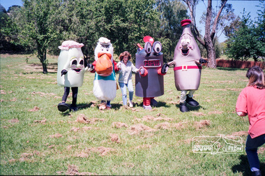 Photograph, Cr Mary Grant with Recycling mascots, c.1990