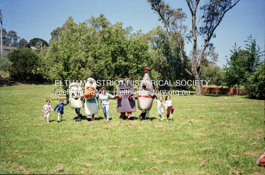 Photograph, Cr Mary Grant with Recycling mascots, c.1990