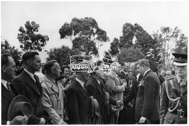 Photograph, Shire of Eltham War Memorial. Dedication of Tower and Cottage. Gen. Sir Dallas Brooks meeting ex-servicemen of the district, 16 November 1951
