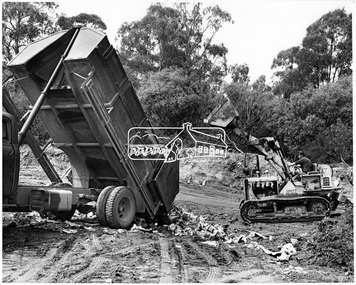Photograph, Land Reclamation by Sanitary Land Fill Method. Main Road, Bridge Street, Diamond creek, Eltham area, November 1966