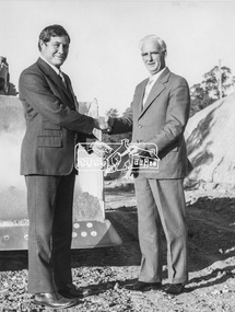 Photograph, Mr. B. O'Regan, Manager of A.N.Z Eltham with Cr. J.O. White, Eltham Shire President, 4 July 1973