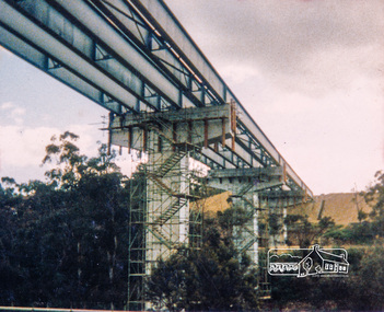Photograph, Looking east across the new 5-span bridge construction across the Plenty River from the western side; Greensborough Bypass construction, c.1986, 1986c