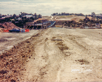 Photograph, Looking west across the new bridge construction across the Plenty River from the eastern side; Greensborough Bypass construction, c.1986, 1986c
