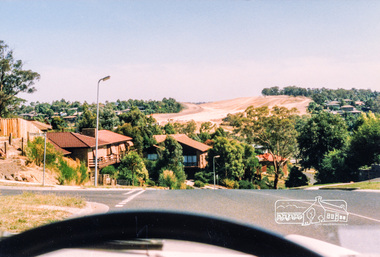 Photograph, Looking west along Plenty River Drive near intersection with Goonyah Court, Greensborough, c.1986, 1986c
