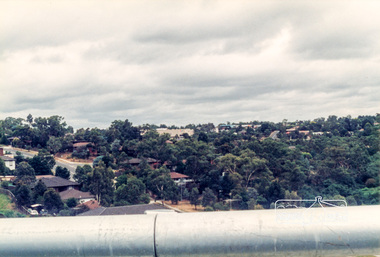 Photograph, Looking south onto the Plenty River Trail Reserve from the new bridge ove the Plenty River; Greensborough Bypass construction, c.1986, 1986c