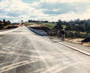 Photograph, Looking west across the new bridge construction across the Plenty River from the eastern side; Greensborough Bypass construction, c.1986, 1986c