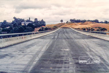 Photograph, Looking west across the new bridge construction across the Plenty River from the eastern side; Greensborough Bypass construction, c.1986, 1986c